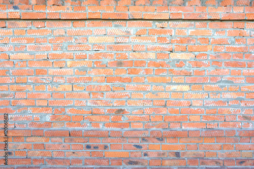 Wall of red brick, texture
