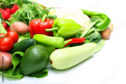 Pile of vegetables on white