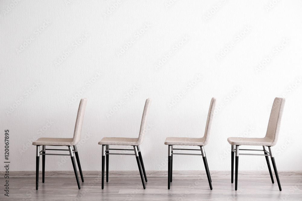 Set of chairs in light room interior Set of chairs in light room interior
