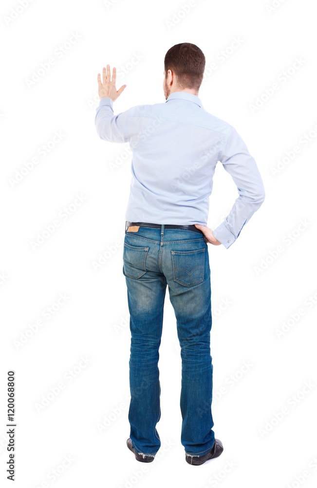 Back view of beautiful business man welcomes Bearded businessman showing an open palm. Back view of beautiful business man welcomes Bearded businessman showing an open palm.