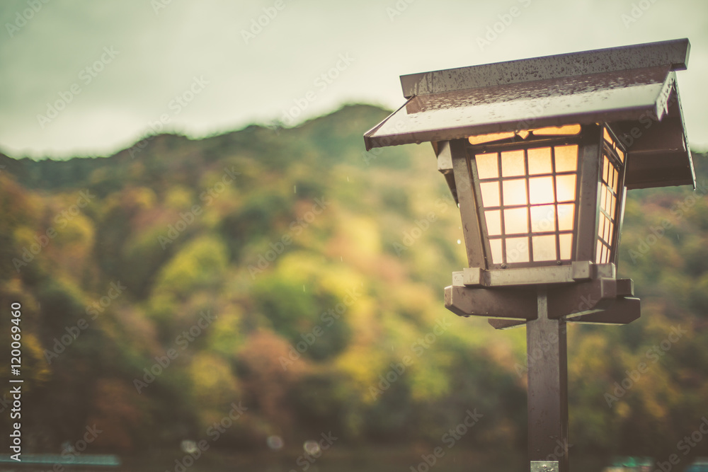 japan old lamp with rainy day background, vintage street lamp composition for text.