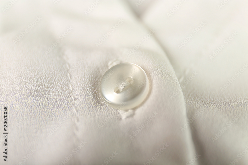 Button on clothes, close up