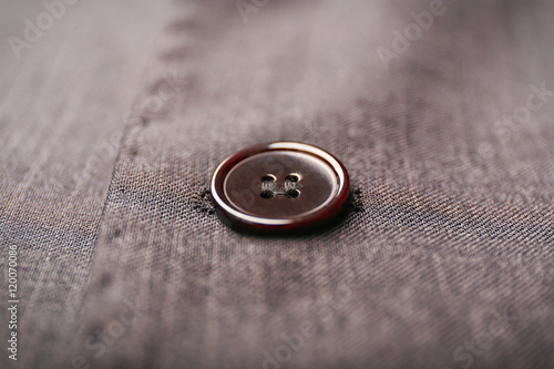 Button on clothes, close up