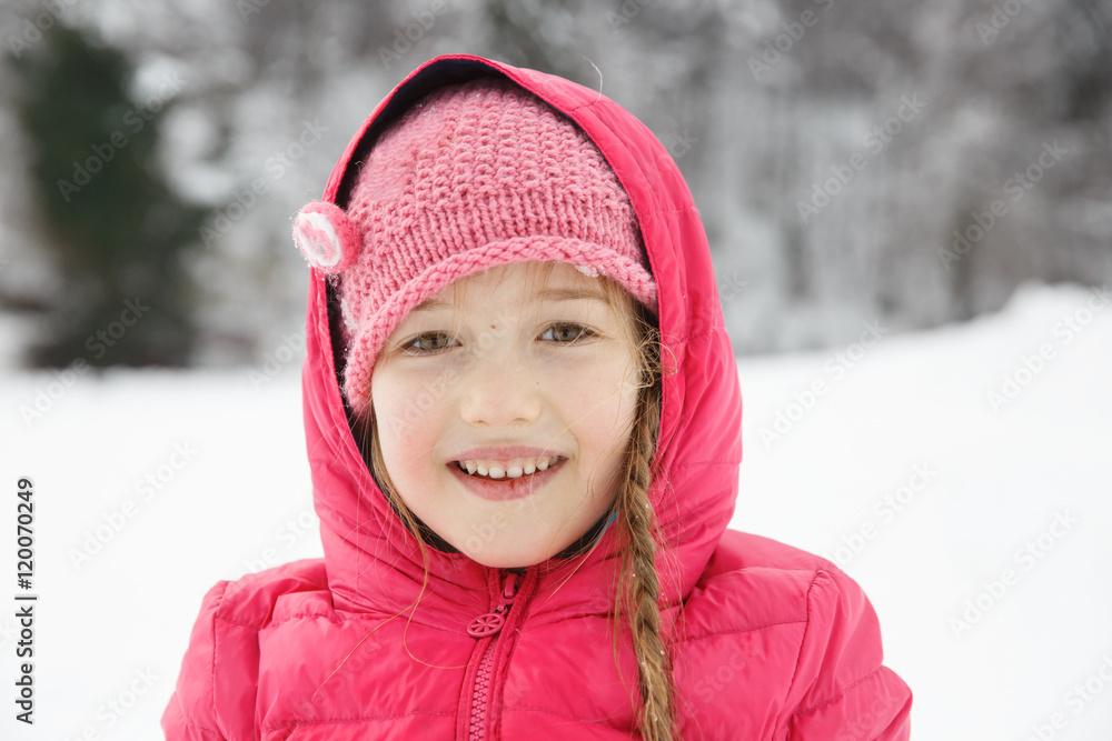 Beautiful girl with braids, enjoying winter and snow Beautiful girl with braids, enjoying winter and snow