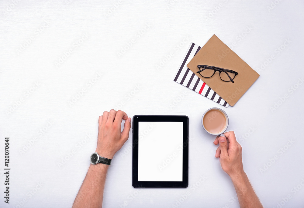 Man working with tablet, top view
