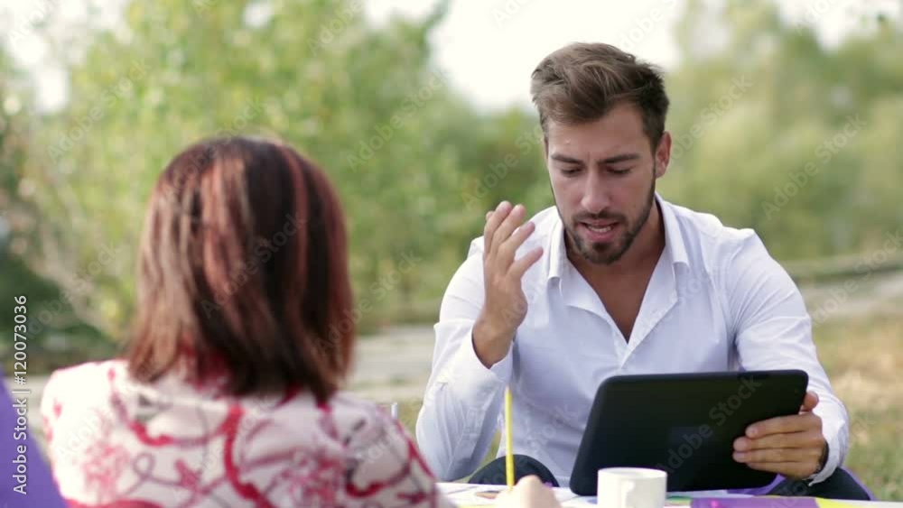 Businessman arguing with his coworker at meeting Businessman arguing with his coworker at meeting