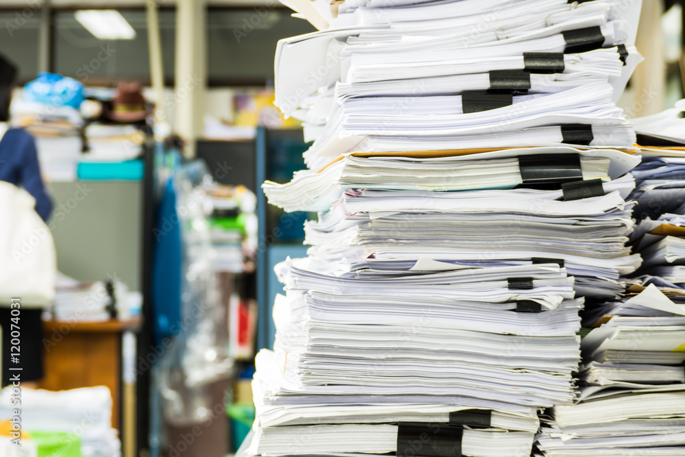 Piles of paper in the office Piles of paper in the office