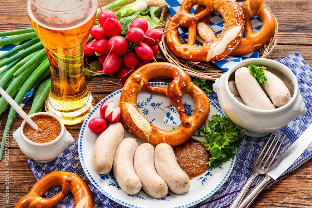 Fototapeta premium White sausages with sweet mustard and pretzel. Oktoberfest menu