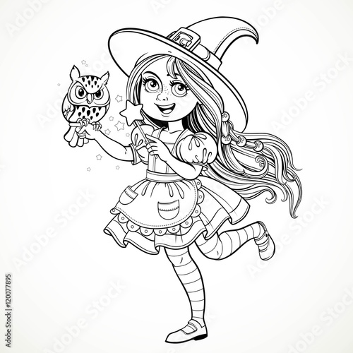 Cute little girl dressed as witch with a owl and magic wand stan