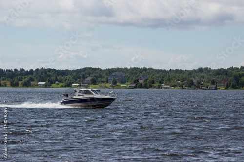 High speed boat on lake moving