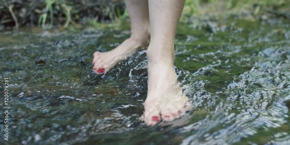 Slow motion handheld close-up of a barefoot woman with red nails wading shallow river rapids, shot on RED Epic Dragon R3D, 4K 120fps
Slow motion handheld close-up of a barefoot woman with red nails wading shallow river rapids, shot on RED Epic Dragon R3D, 4K 120fps