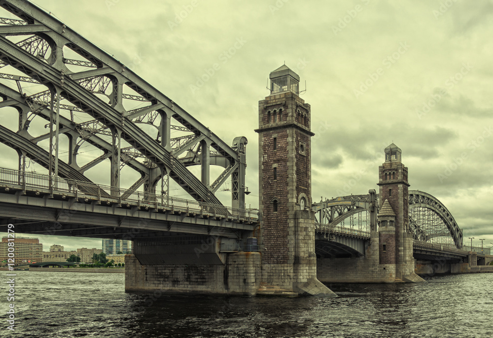 Saint Petersburg, Russia, a view of Bolsheokhtinsky bridge over the Neva river at a very cloudy spring day.