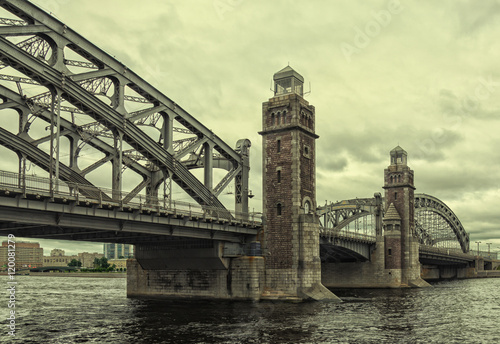 Saint Petersburg, Russia, a view of Bolsheokhtinsky bridge over the Neva river at a very cloudy spring day.