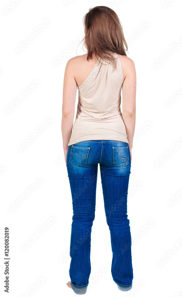 Back view of beautiful yong woman looks ahead. rear view. Isolated over white . Back view of beautiful yong woman looks ahead. rear view. Isolated over white .