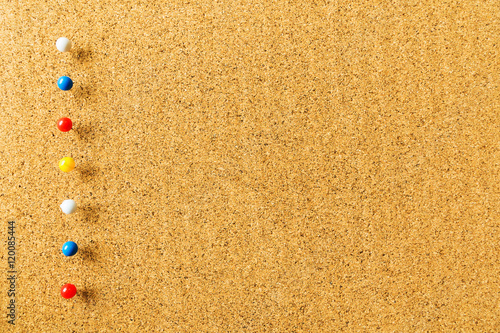 For beautiful background with cork board texture color pins