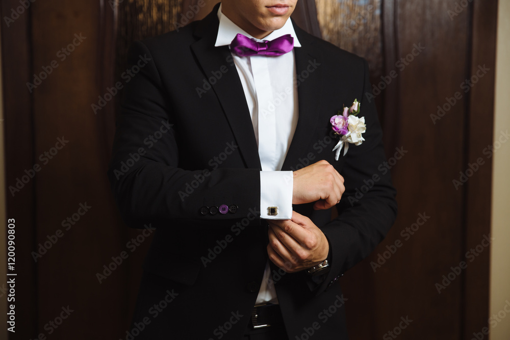Man holding bow tie. Elegant gentleman clother. Man holding bow tie. Elegant gentleman clother.