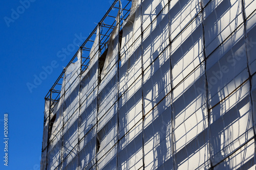 construction industry concept   building with scaffolding