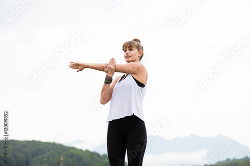 young woman traveling on mountains photo