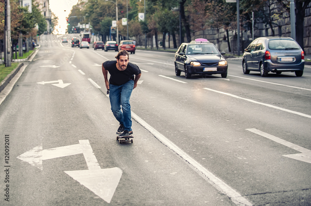 Professional skateboarder riding a skateboard slope on the capital city streets Professional skateboarder riding a skateboard slope on the capital city streets