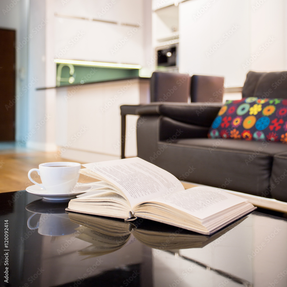 Fototapeta premium Book on a table in apartment