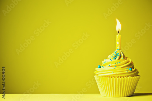 Yellow birthday cupcake
