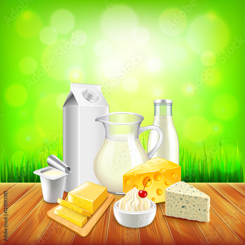 Dairy products on wooden table, green grass background