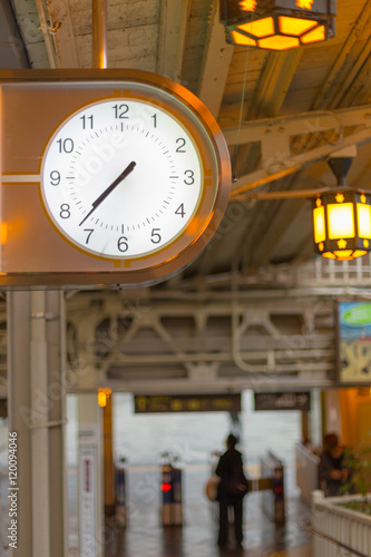 clock at Japanese train station.