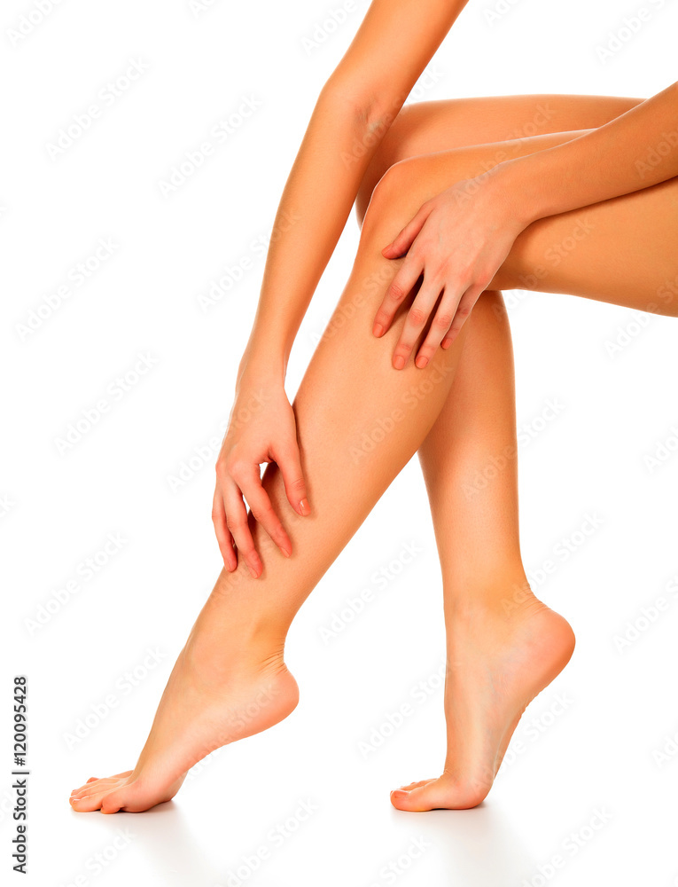 Female legs and hands, white background, isolated Female legs and hands, white background, isolated