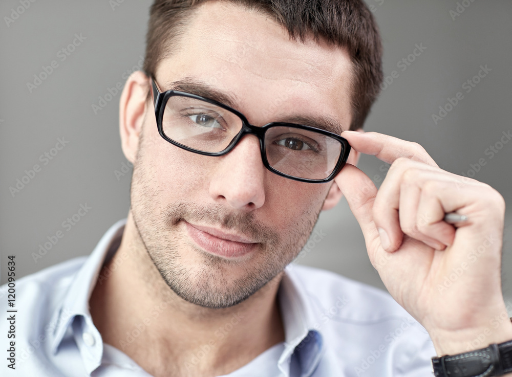 portrait of businessman in eyeglasses at office portrait of businessman in eyeglasses at office