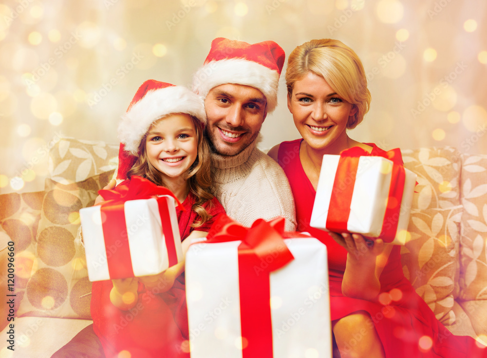 smiling family giving many gift boxes smiling family giving many gift boxes