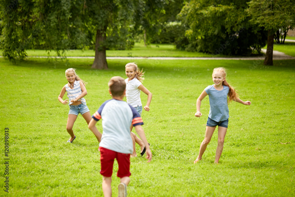Obraz premium happy kids running and playing game outdoors