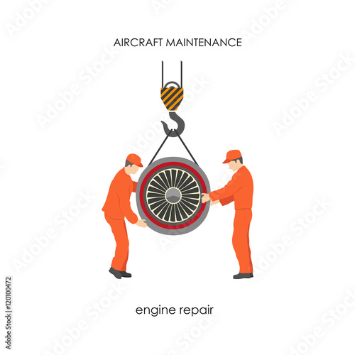 Workers raised the aircraft engine on a lift. Repair and mainten