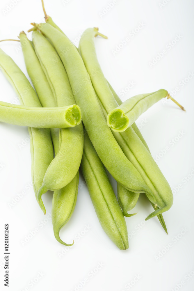 green beans on a white background. color image of green vegetables side view green beans on a white background. color image of green vegetables side view