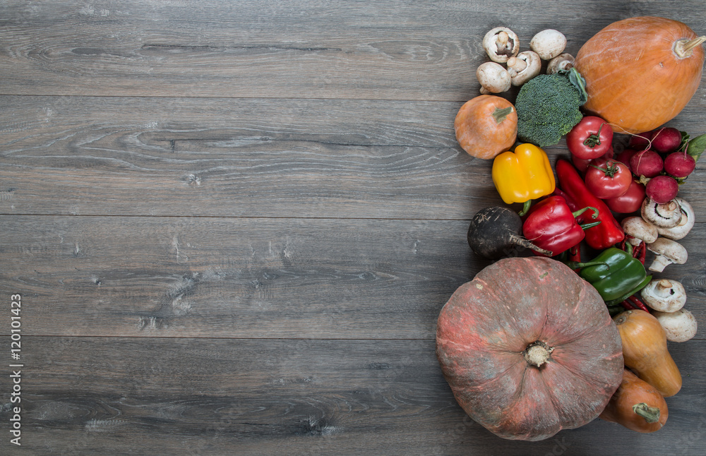 pumpkin, vegetables on a rustic wooden table pumpkin, vegetables on a rustic wooden table