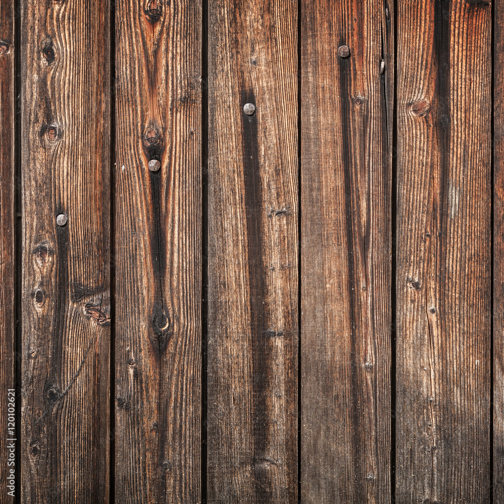 Old dark brown wooden wall background Old dark brown wooden wall background