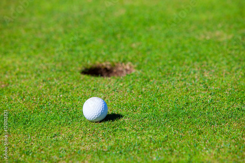 Golf ball and the hole