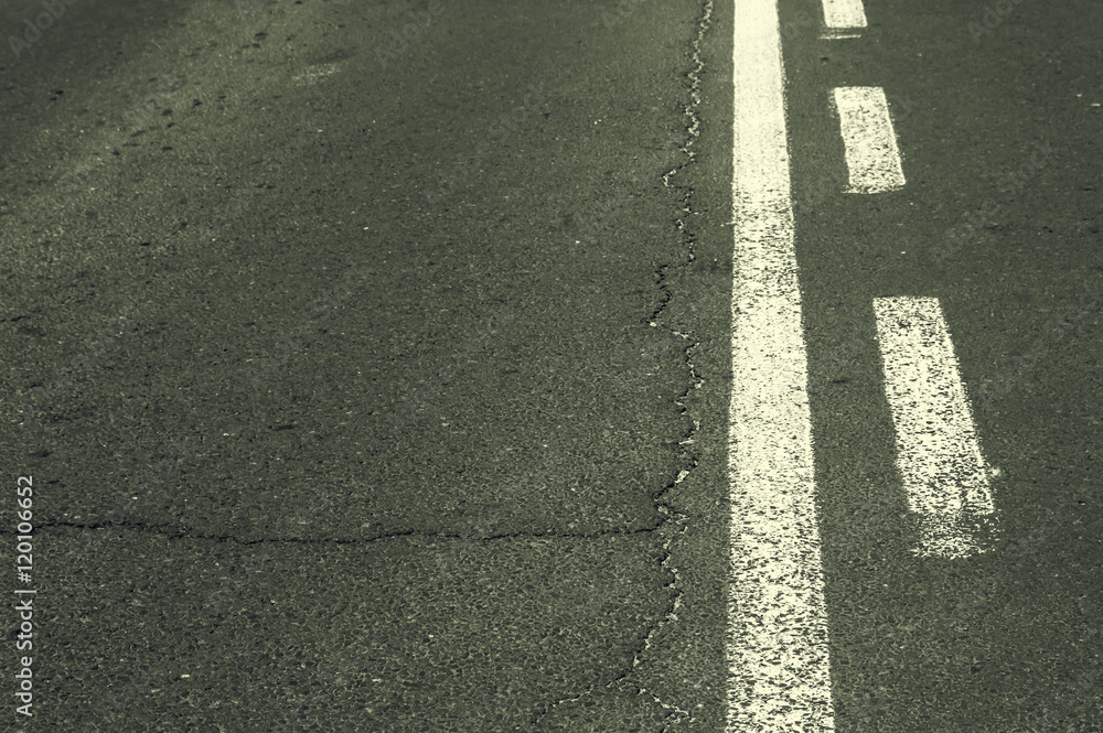 Fototapeta premium Double white line on asphalt road.