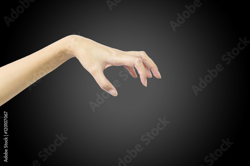 Closeup action of woman hand catching and hold something in hand isolated on black background