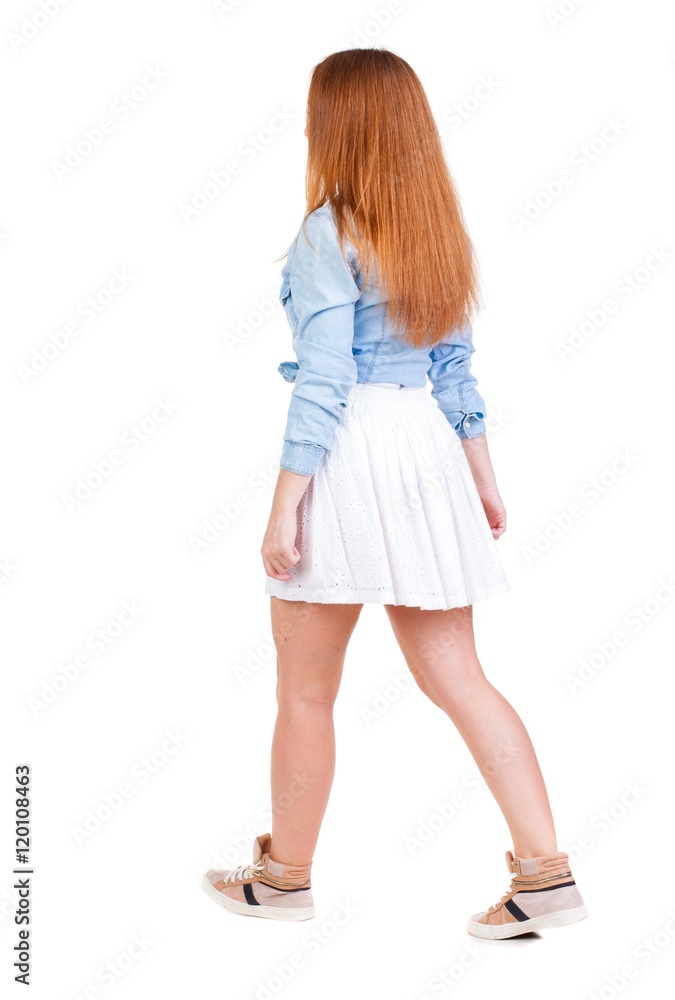 back view of walking woman in dress. beautiful redhead girl in motion. backside view of person. Rear view people collection. Isolated over white background. back view of walking woman in dress. beautiful redhead girl in motion. backside view of person. Rear view people collection. Isolated over white background.
