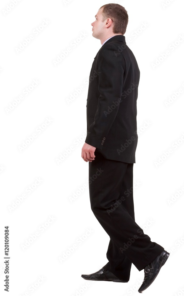 back view of going business man. walking young guy in black suit. Isolated over white background. Rear view people collection. backside view of person. back view of going business man. walking young guy in black suit. Isolated over white background. Rear view people collection. backside view of person.