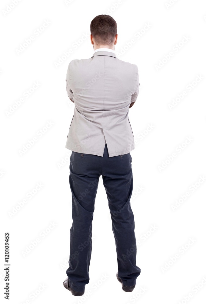 back view of Business man looks. Rear view people collection. backside view of person. Isolated over white background. The guy put his hands on his chest. back view of Business man looks. Rear view people collection. backside view of person. Isolated over white background. The guy put his hands on his chest.