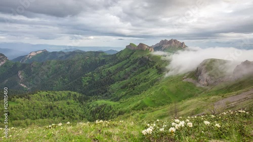 Russia, timelapse. The formation and movement of clouds over the summer slopes of Adygea Bolshoy Thach and the Caucasus Mountains