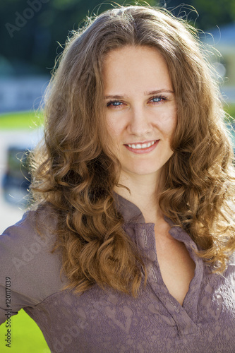 Portrait of beautiful young happy woman