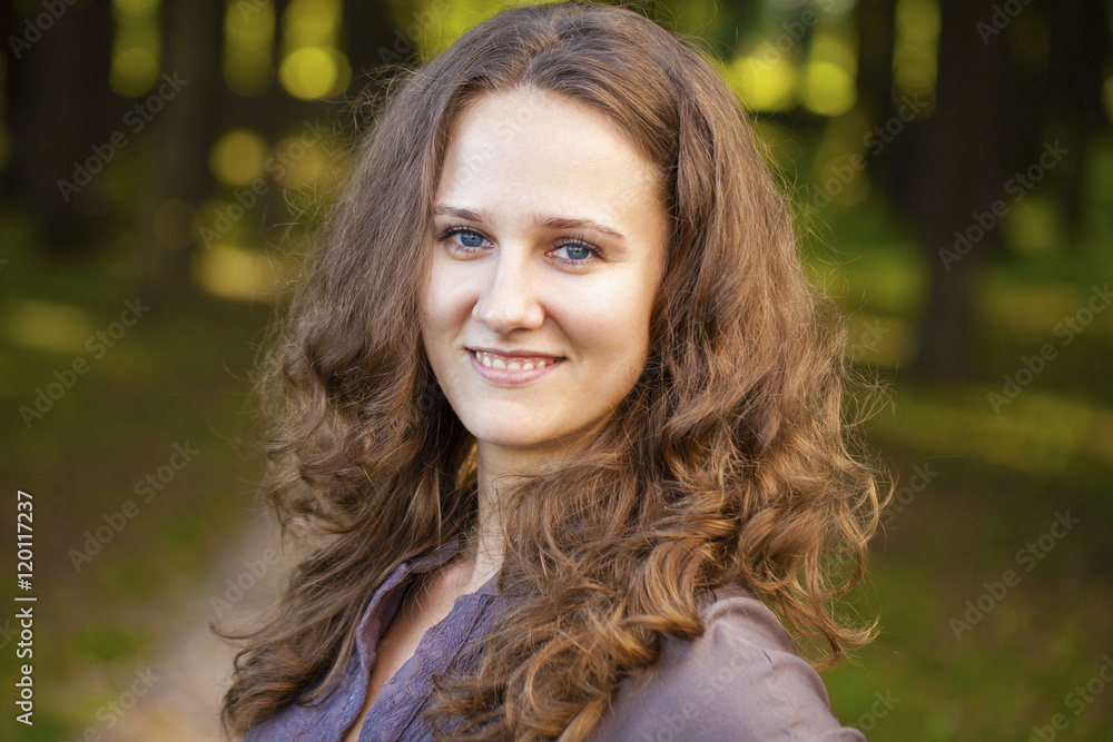 Fototapeta premium Portrait of beautiful young happy woman