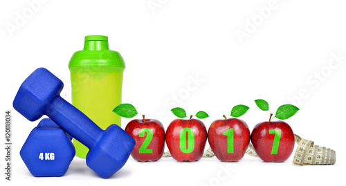 Red apples, dumbbells and protein shaker isolated on white. Healthy resolutions for the New Year 2017