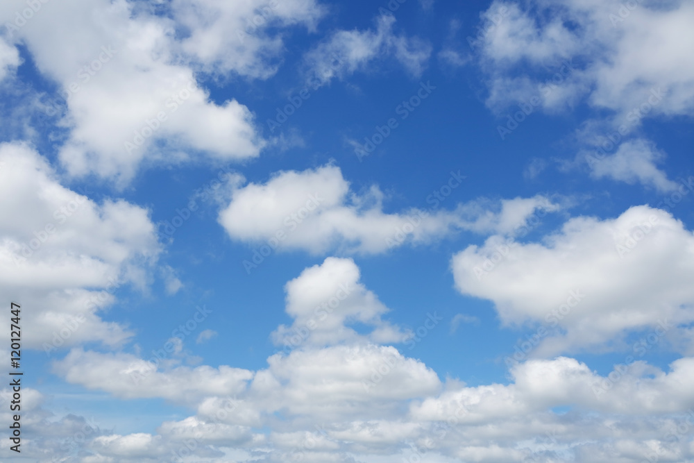 White clouds flying against clear blue sky. White clouds flying against clear blue sky.