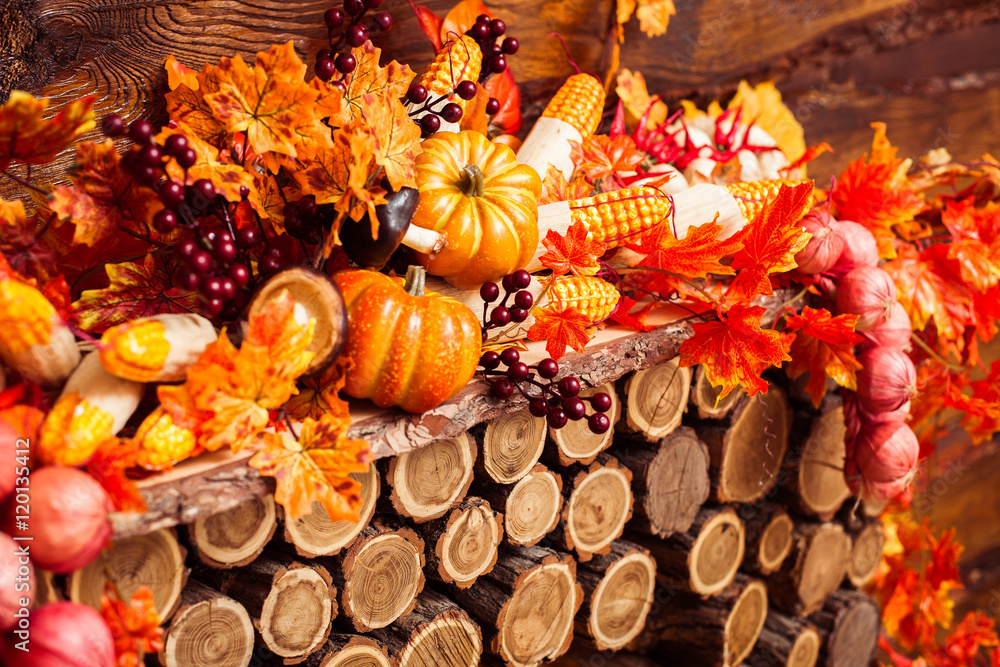 Autumn scenery consisting of wicker wreath, orange leaves, autum Autumn scenery consisting of wicker wreath, orange leaves, autum