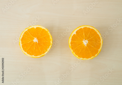 Top view - Orange fruit on wooden background