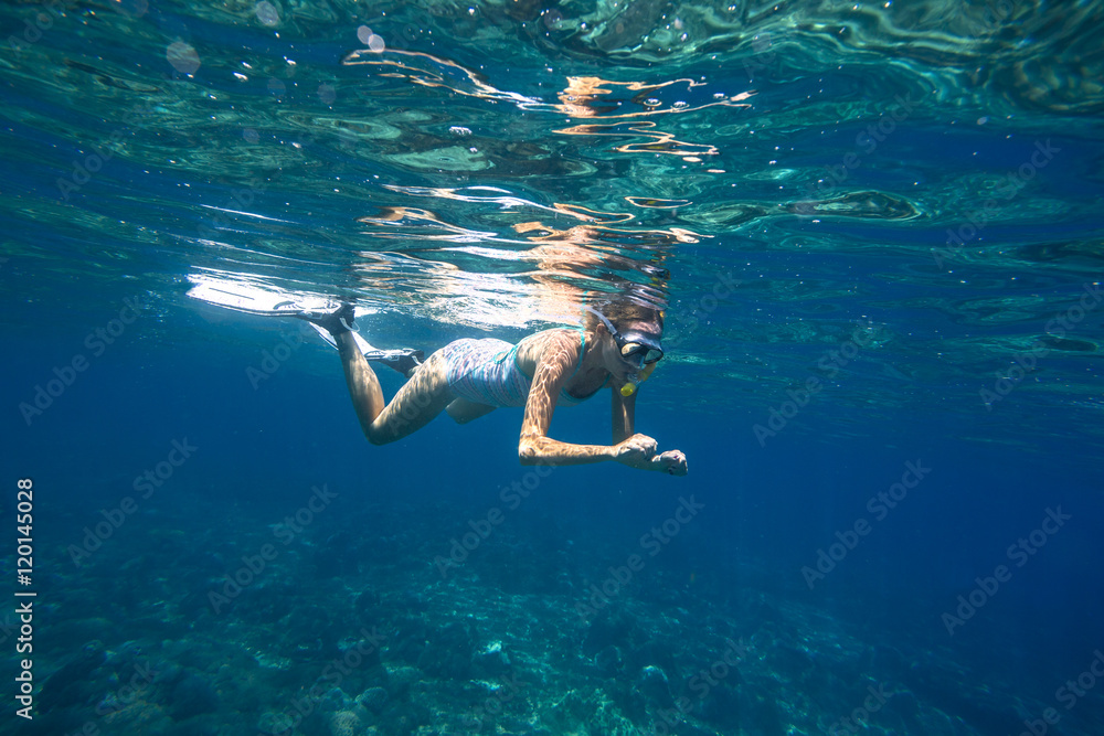 Young women is snorkeling