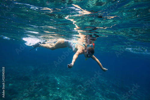 Young Women Snorkeling in the Tropical Water